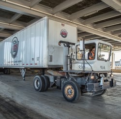 Anderson Trucking Service (ATS) van trailer being backed onto a roll-on/roll-off (Ro/Ro) vessel