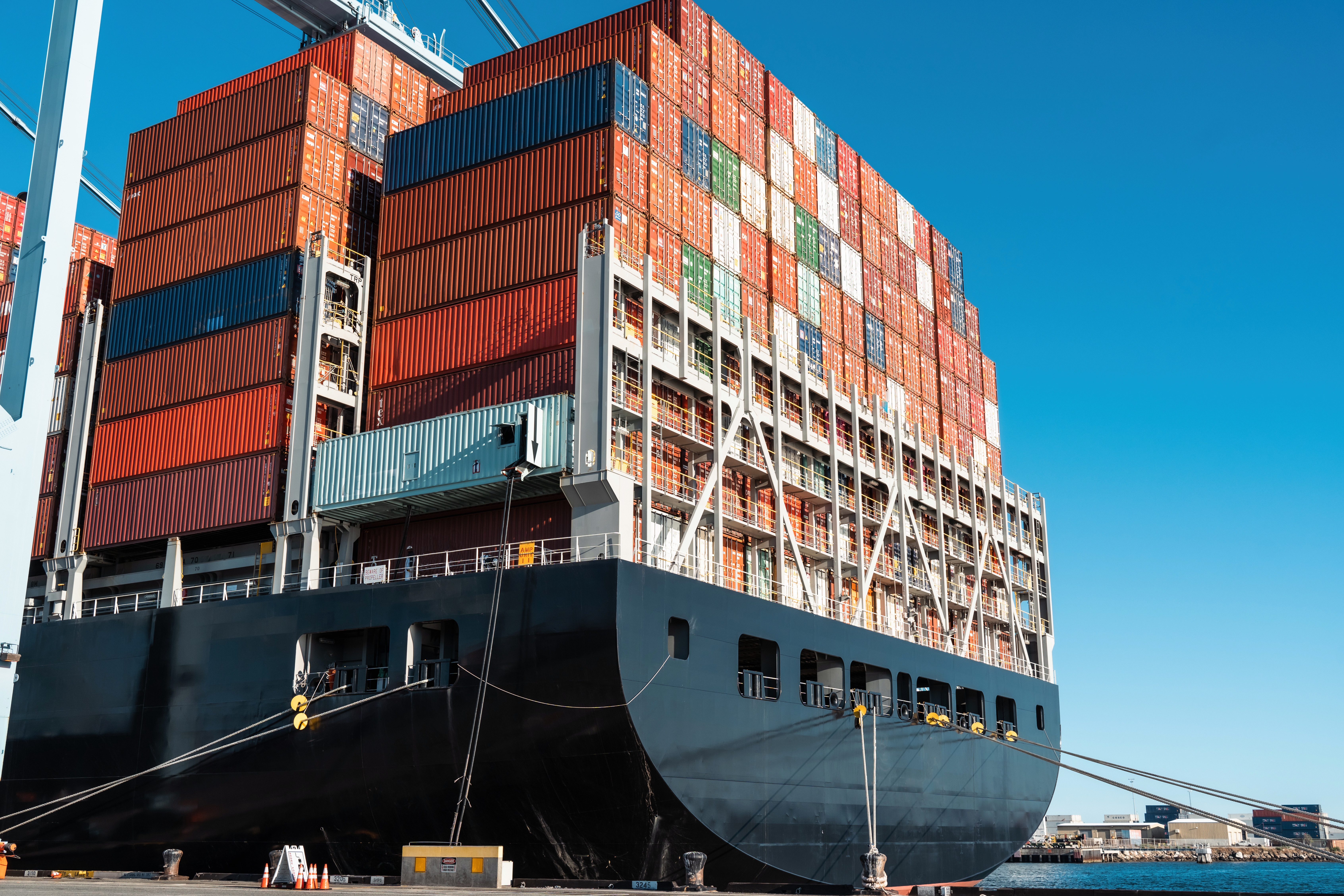 An ocean vessel loaded with freight shipping containers