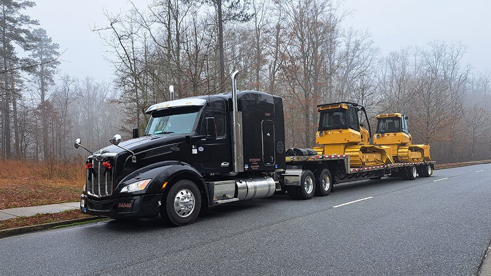 Two-Bulldozers-on-Step-Deck-Trailer