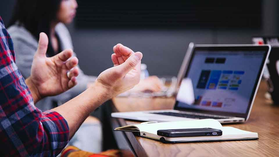 Man-using-hands-to-emphasize