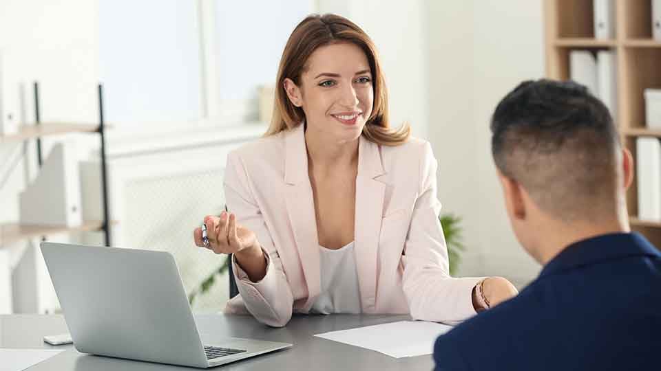 Female-interviewer-asking-questions-to-job-candidate