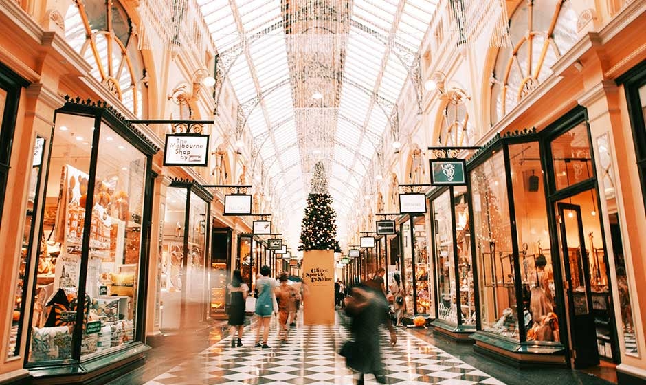 Shoppers at an indoor retail center during the holidays