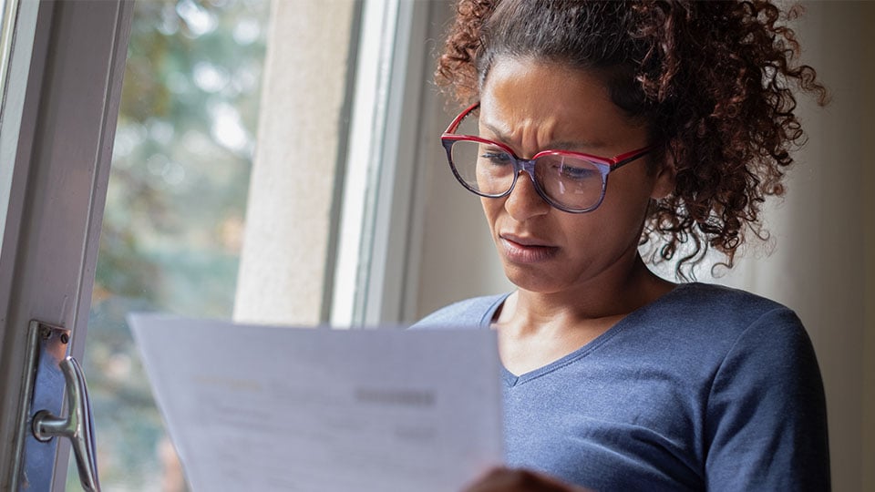 Woman surprised by bill