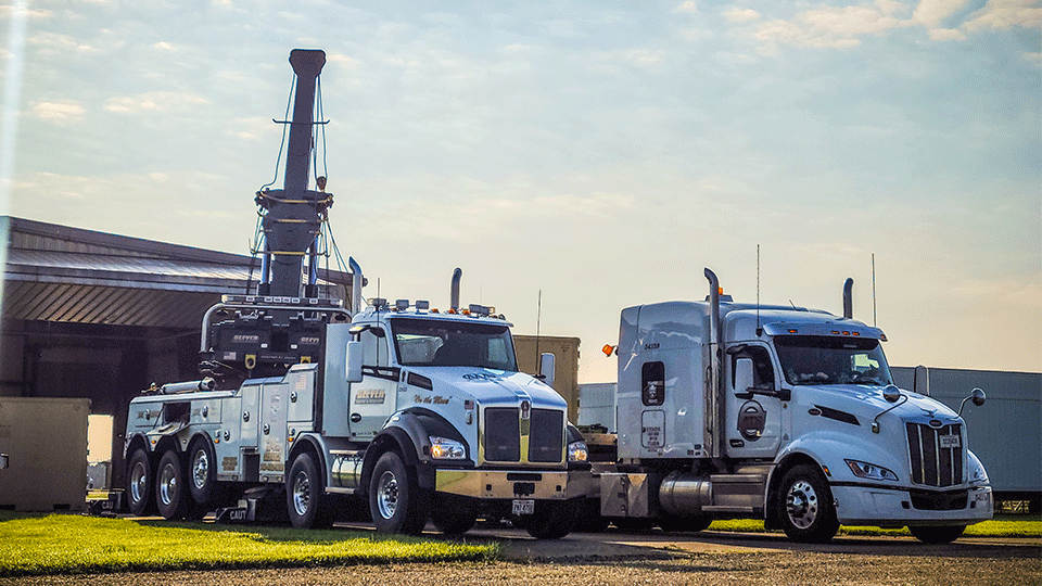 Flatbed-Truck-Next-To-Mobile-Crane