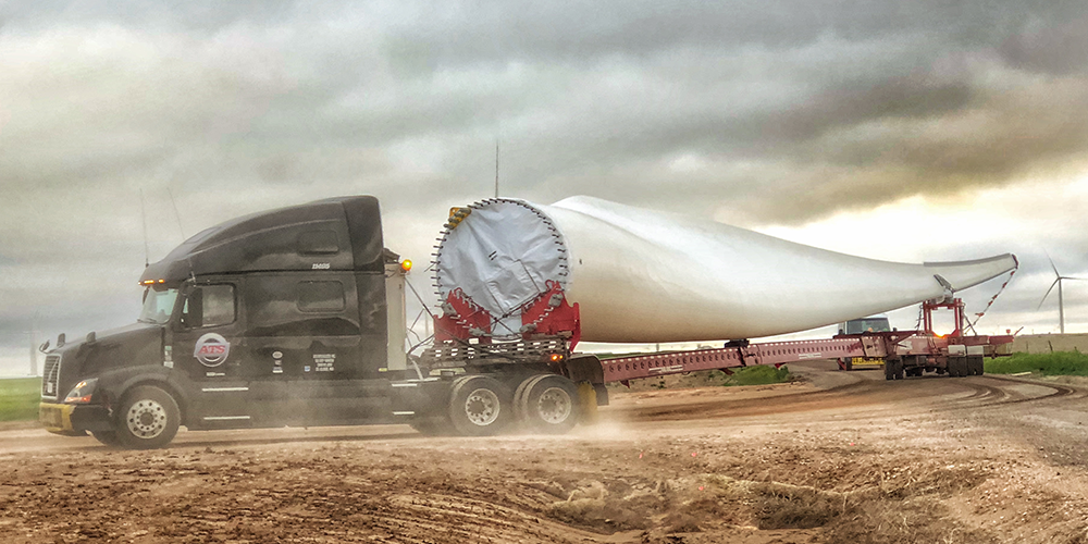 Blade-Truck-Driving-Through-Wind-Site