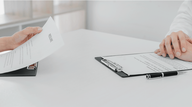 Interview-atmosphere-with-resume-visible