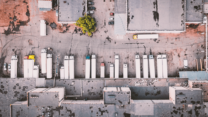 warehouse-multiple-van-trailers-unloading
