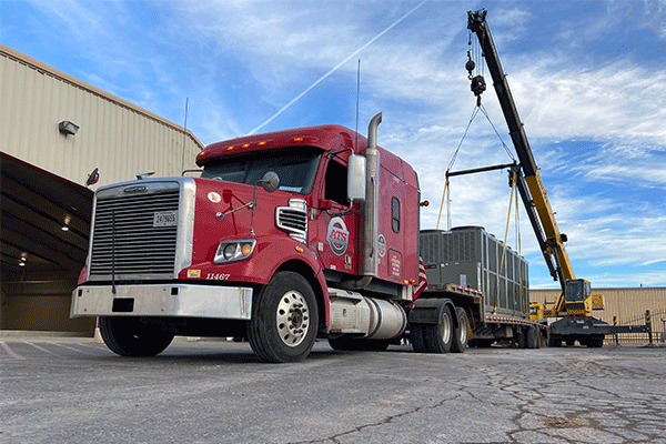 crane-loaded-step-deck-freight