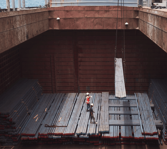 Two Stevedores Loading Vessel