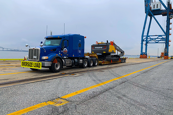 semi-at-port-loaded-with-crane