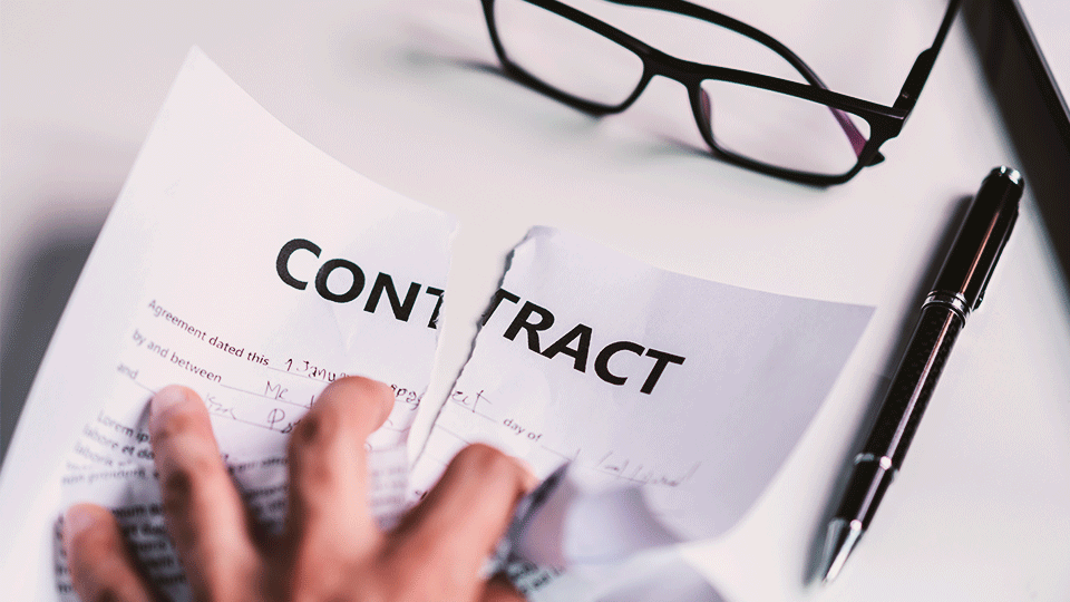 Man-tearing-freight-rate-contract